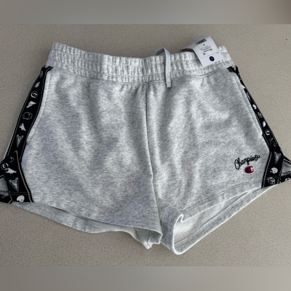 Champion women’s standard ash heather shorts motif taping, size Medium.